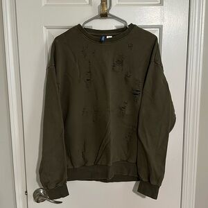 H&M ‘thrashed’ sweatshirt